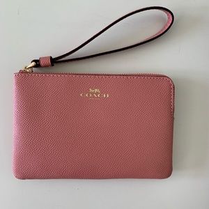 Blush pink coach wristlet